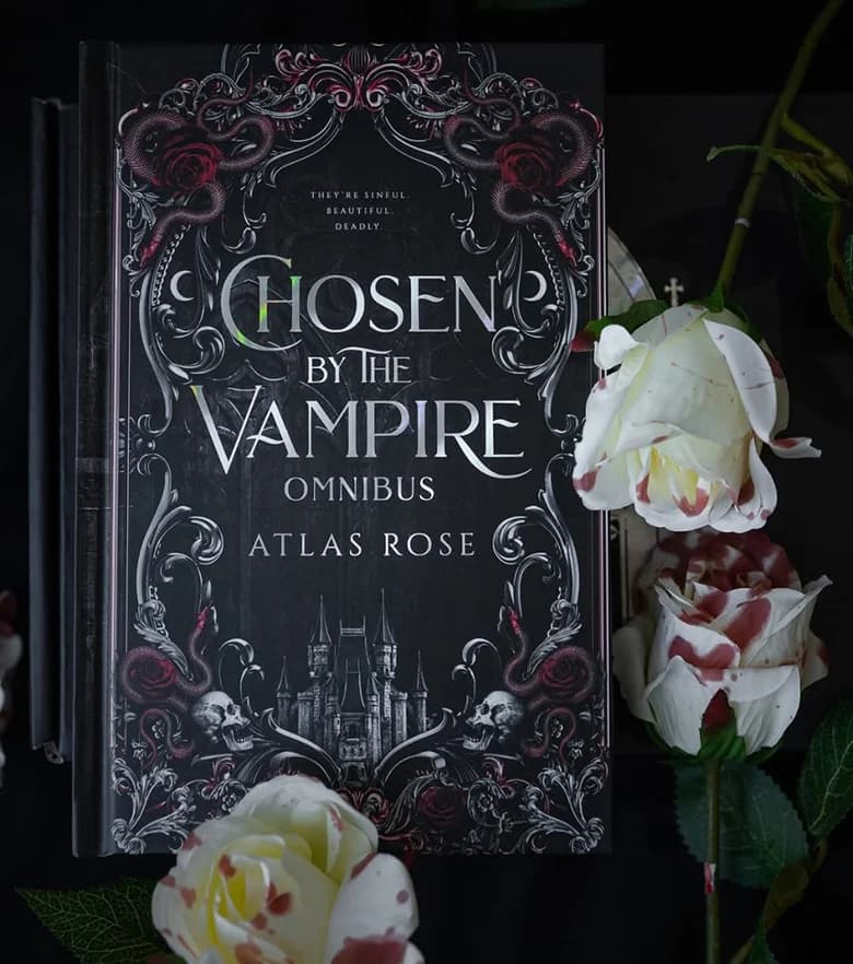 Chosen by the Vampire Omnibus by Atlas Rose beside white roses
